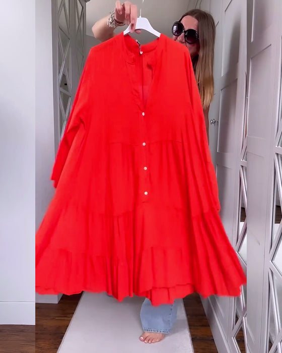 Enfärgad V-ringad klänning med utsvängd långärmad och patchwork