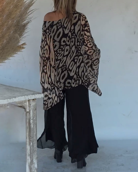 Oregelbunden Blus Med Fladdermusmönster Och Lång Ärm