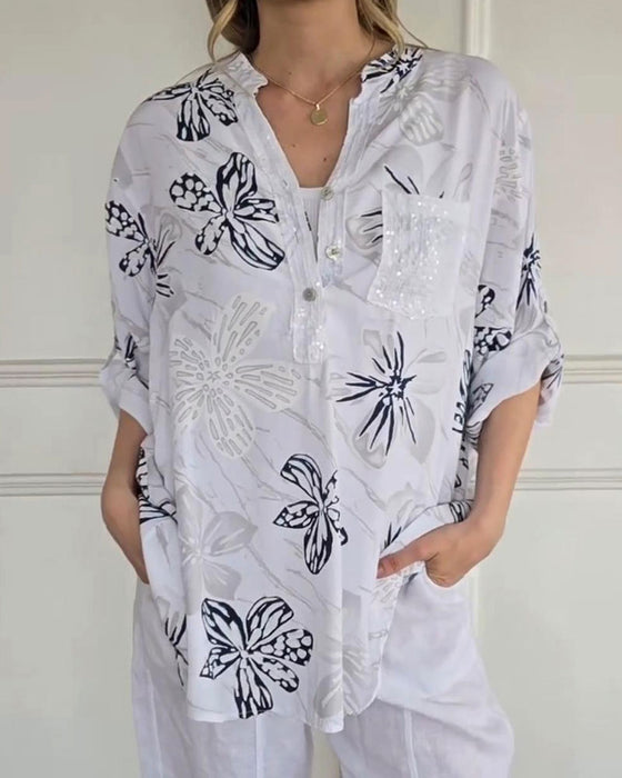 Blus Blomsterknappning V-hals