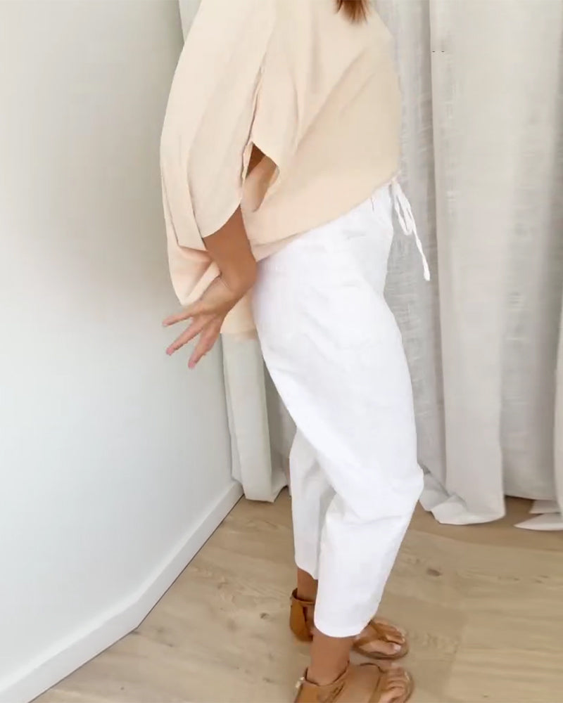 Byxor I Denim Med Fickor Och Kort Längd