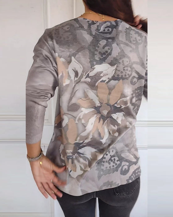 Långärmad topp med V-ringad vintage med blommigt tryck