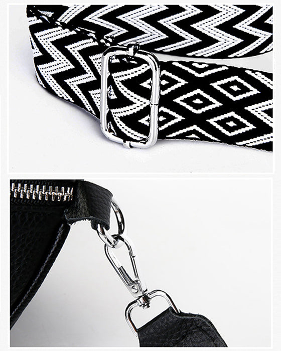 Kvinnors axelväska i sadelform, som också kan bäras som en crossbody-väska