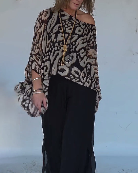 Oregelbunden Blus Med Fladdermusmönster Och Lång Ärm
