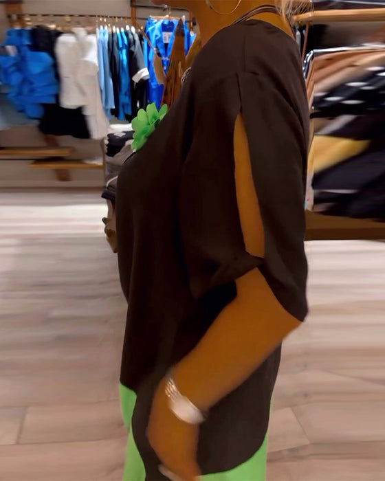 Rund halsad klänning med lös patchwork i färg