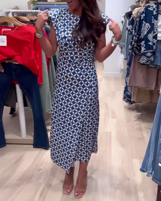 Geometriskt tryck ärmlös, rund halsad elegant klänning