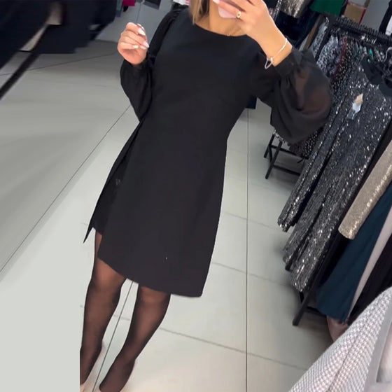 Elegant enfärgad klänning