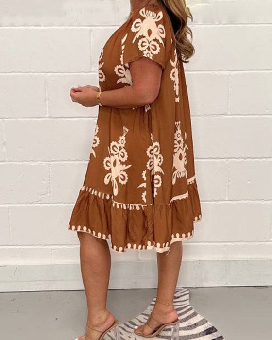 Tryckt klänning med rund hals