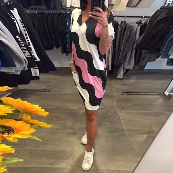 klänning V-ringad vågtryck