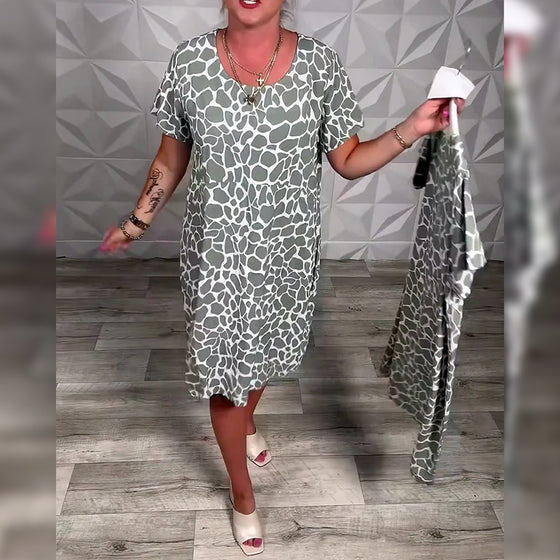 Klänning avslappnad med tryck och rund halsringning