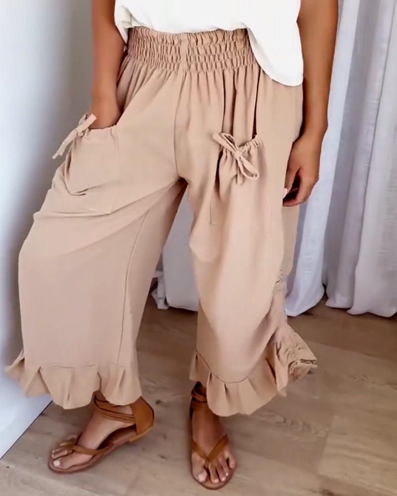 Snygg fickdesign med resår i midjan på byxorna