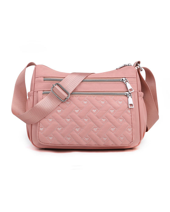 Avslappnad axelremsväska med stor kapacitet