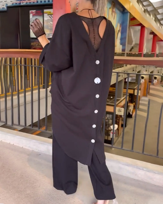 Topp med lös passform och långa ärmar