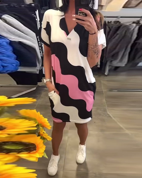 klänning V-ringad vågtryck