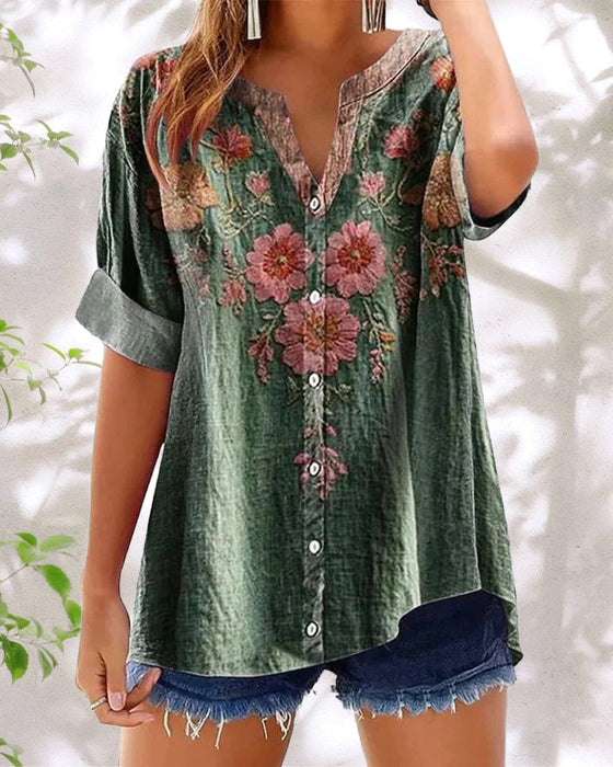 Blus med modetryck och v-ringning