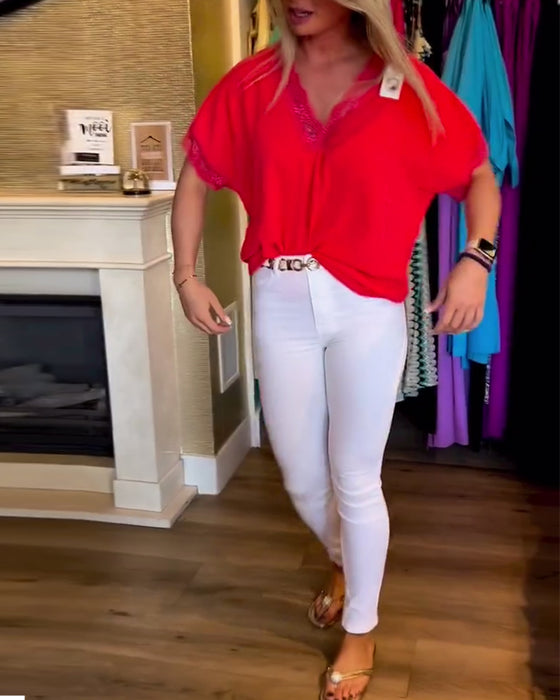 Skarvad spets v-ringad enfärgad topp