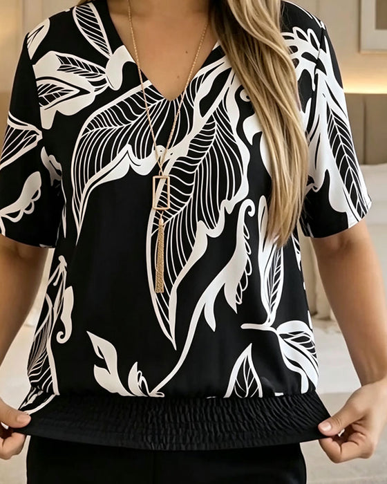 Blus Blommönster Resårfåll Kortärmad