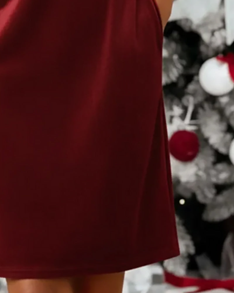 Modig lösittande klänning med runt halsutsnitt