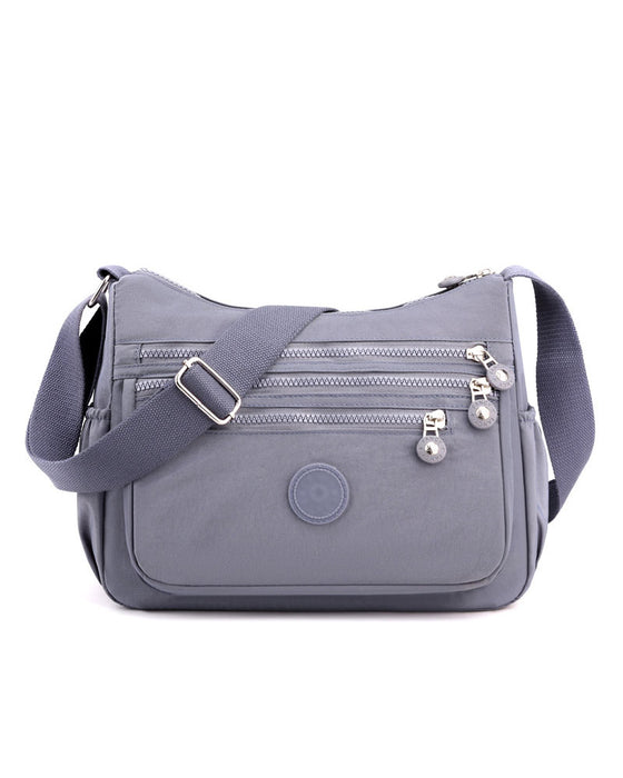 ⌛ Tidsbegränsat Erbjudande – Lätt Vattenavvisande Crossbody Väska 👜