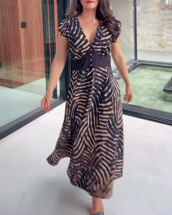 Tryckt Klänning Med V-ringning & Lotusskivsärmar