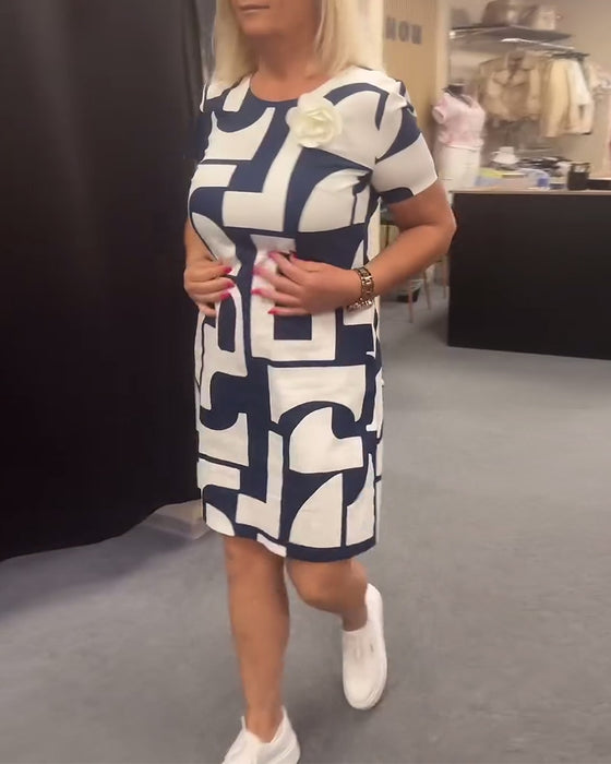Geometriskt tryck fickklänning med rund hals