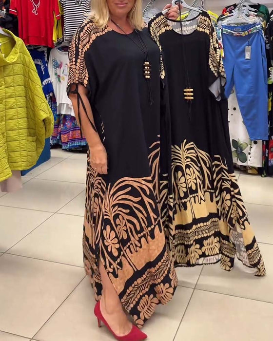 Tryckt rund halsad kortärmad lös klänning med snörning