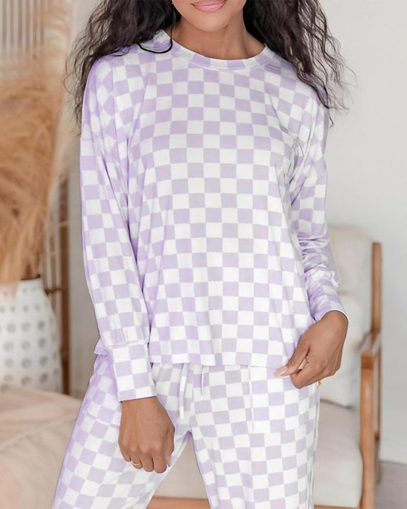 Tvådelade set med rund halsringning och rutigt mönster