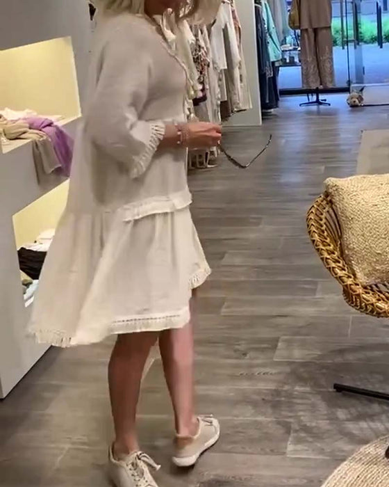 V-ringad frans i spets avslappnad klänning