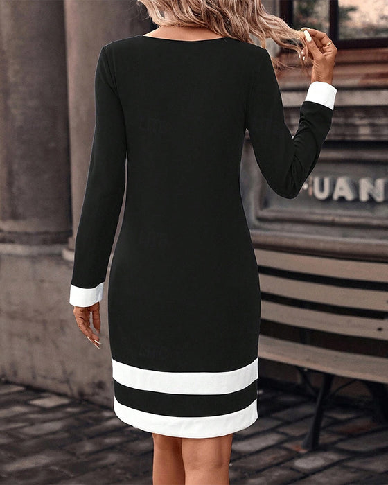 Storblommig klänning med rund hals i färgblock