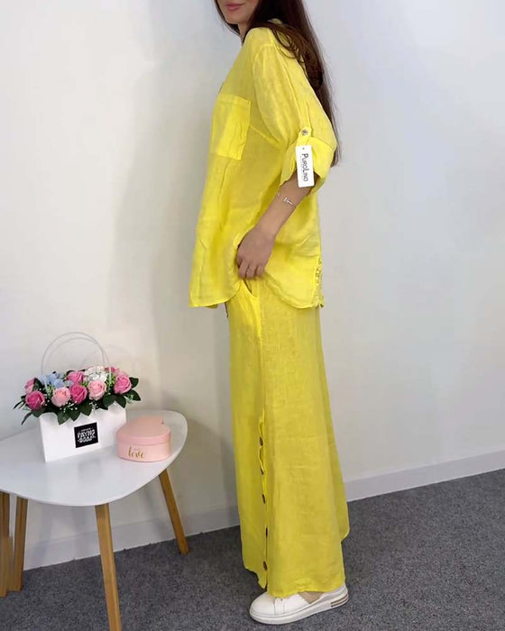 Enfärgad knappficka spetsblus byxor med vida ben