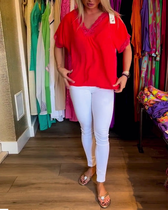 Skarvad spets v-ringad enfärgad topp