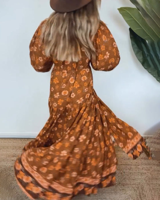 Vintage blommig klänning med V-ringad lanternärm