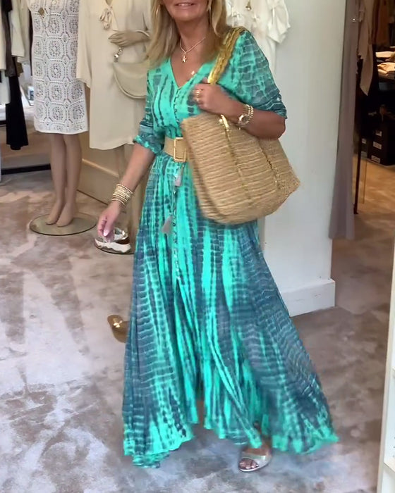 Tryckt V-ringad maxiklänning med knappar