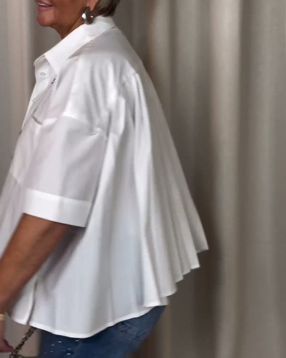 Rynkad blus med kort ärm