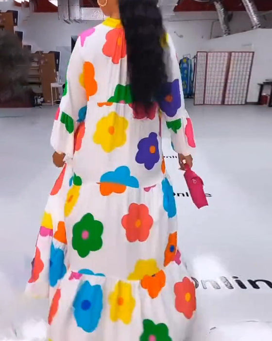 Färgglad blommig ledig klänning med klockärm