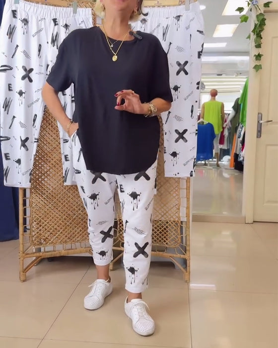 Byxor i mellanhög avslappnad tryck