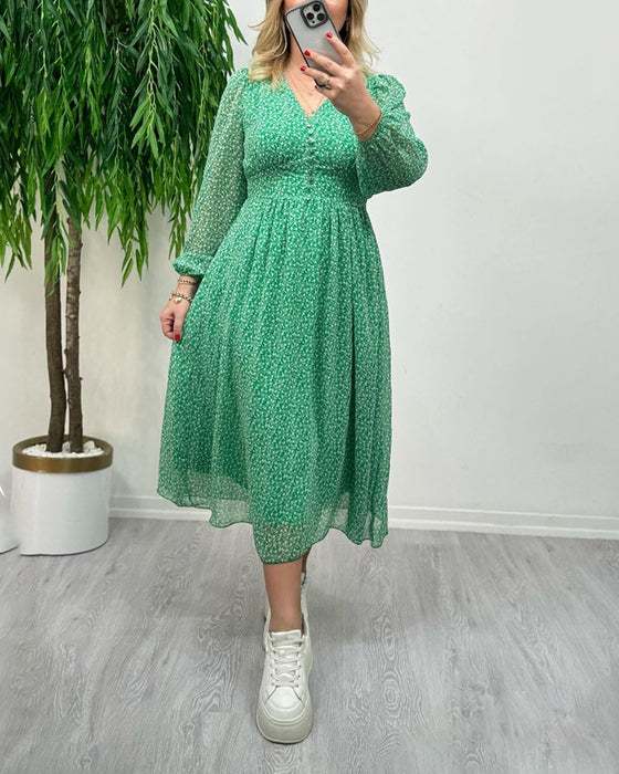 Elegant klänning med tryck