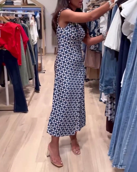 Geometriskt tryck ärmlös, rund halsad elegant klänning