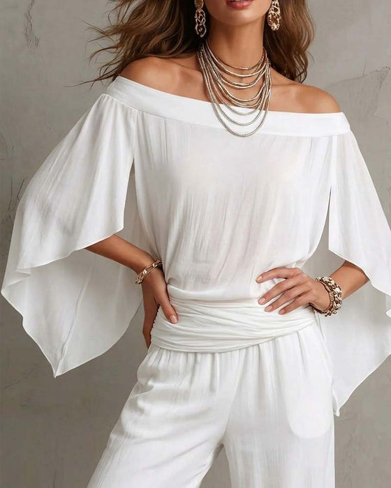 Blus Off-Shoulder Oregelbunden Löss