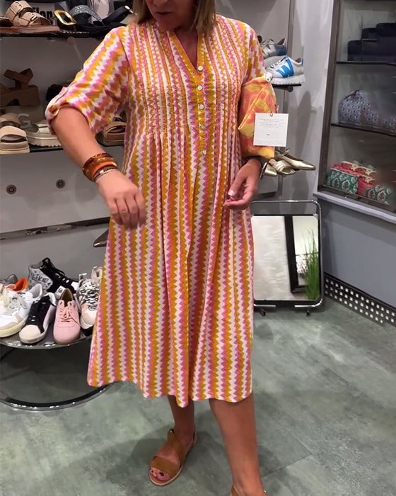 Klänning med vågmönster