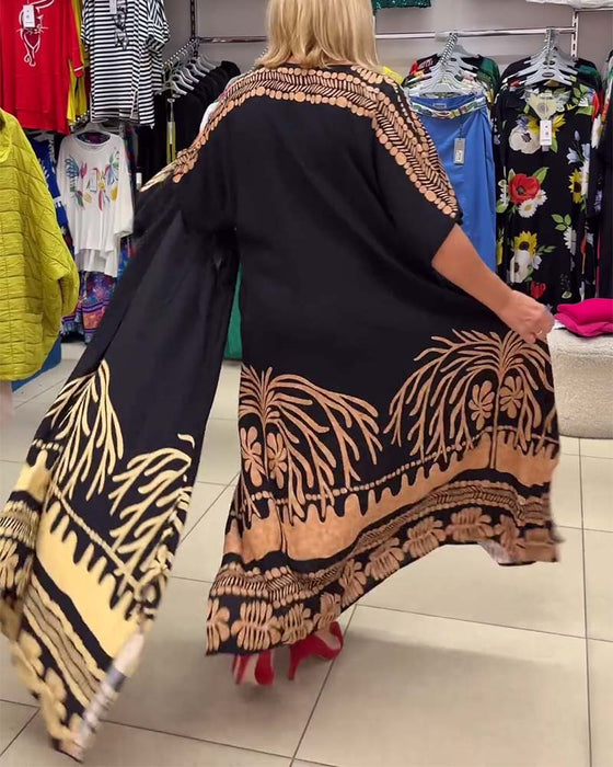 Tryckt rund halsad kortärmad lös klänning med snörning