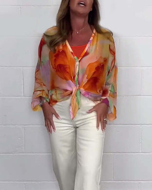 Avslappnad blus med V-ringning och lång ärm