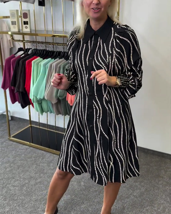 Klänning Slagkrage Vågmönster Kedjedetalj