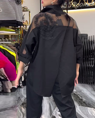 Lapelblom i spets med lapptäcke