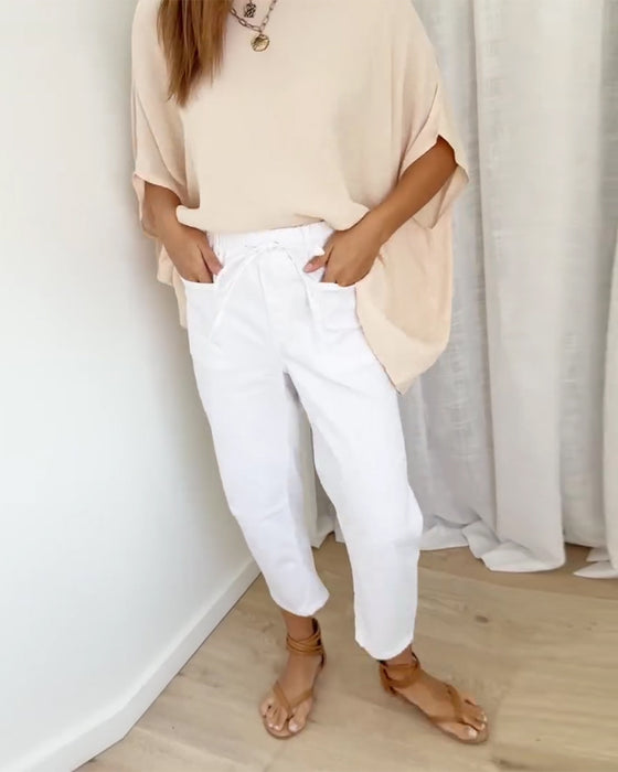 Byxor I Denim Med Fickor Och Kort Längd