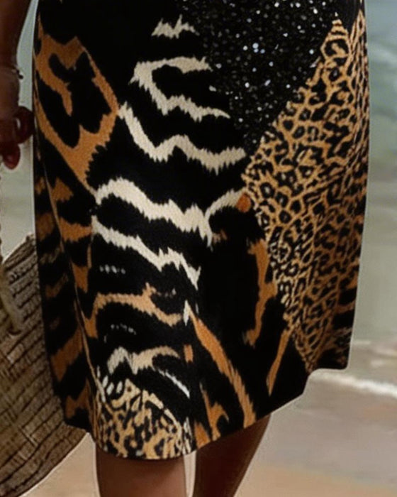 Klänning Med Leopardmönster Och V-Ringning