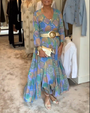 Vintage tryckt klänning med knappslits och lång ärm