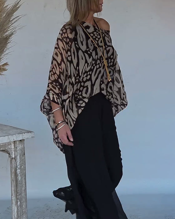 Oregelbunden Blus Med Fladdermusmönster Och Lång Ärm