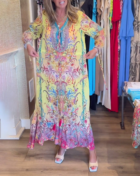 Långärmad resortklänning med tryck