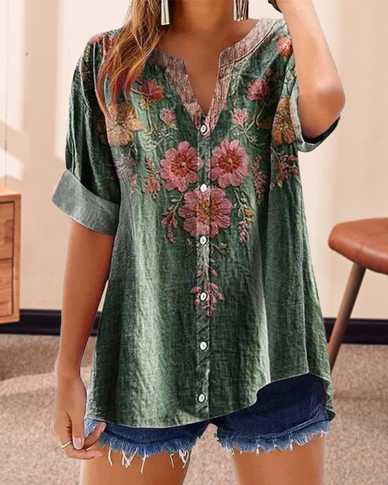 Blus med modetryck och v-ringning