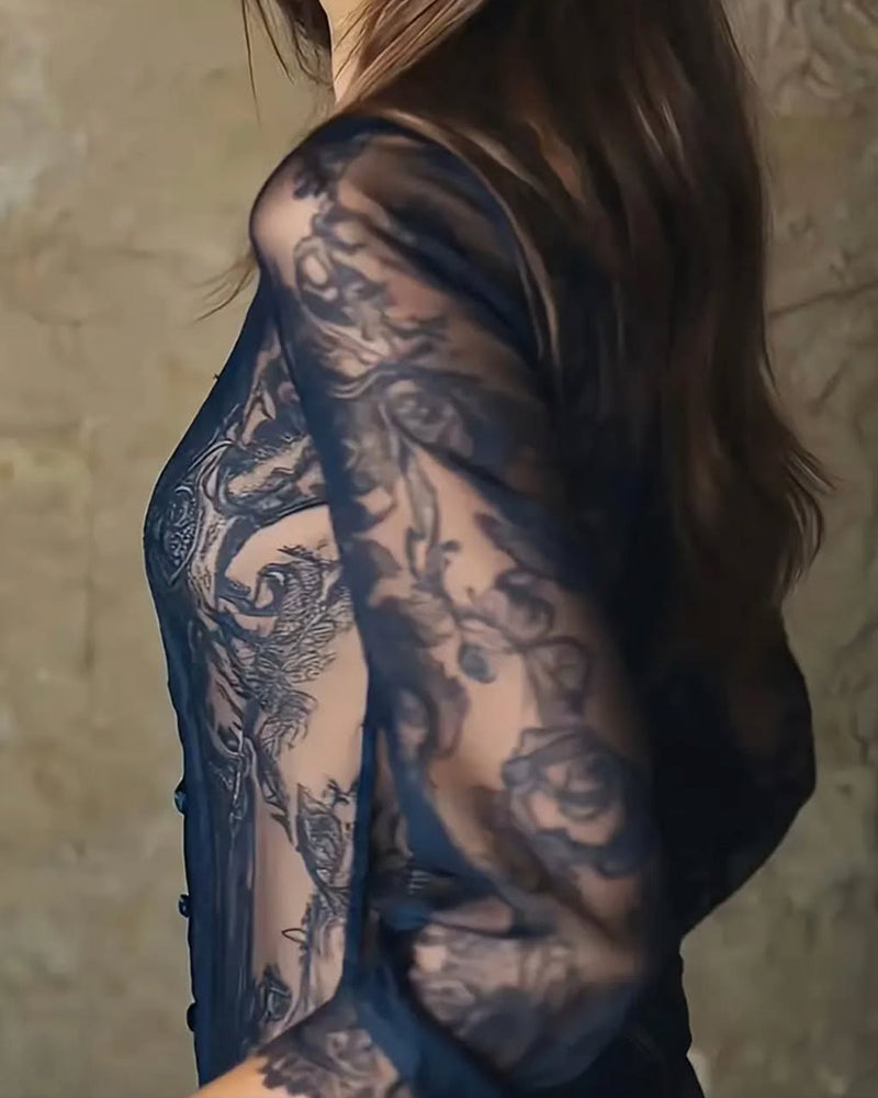 Blus med modern spetskant och tryck